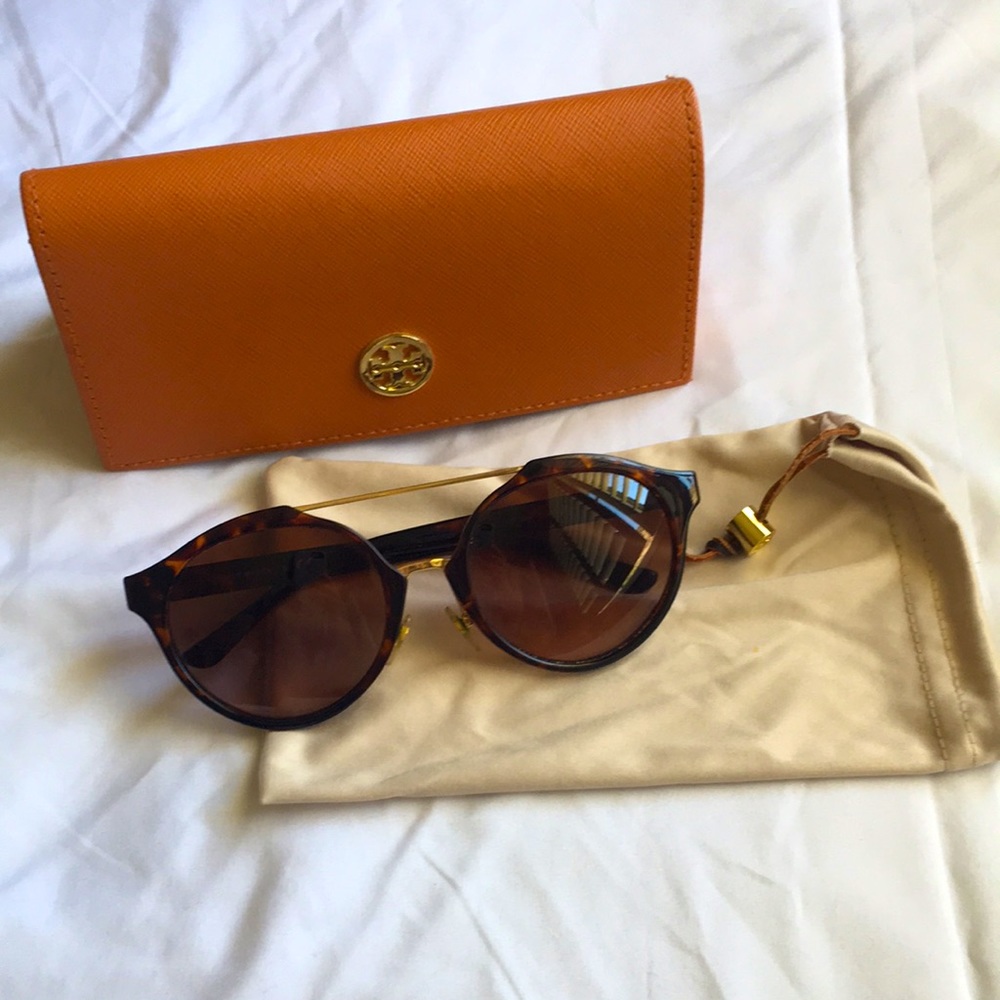 Tory Burch sunglasses.